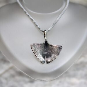 Pendant shaped like a Ginkgo Biloba leaf in silver