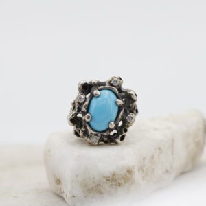 Silver and gold ring with Turquoise stone and 4 grey diamonds