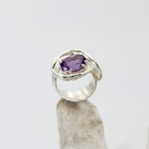 Silver Ring with Amethyst in a Nest-Style Bezel Setting
