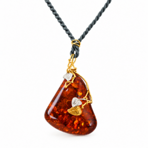 Gold pendant with cognac-colored amber